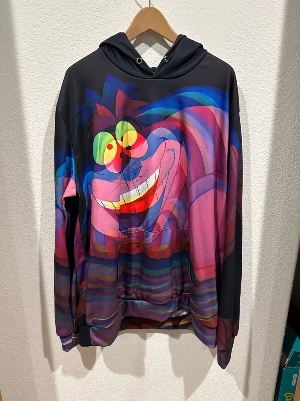 Men's Black Graphic Hoodie with Multicolor Cheshire Cat Design